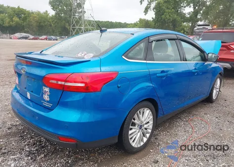 2015 Ford Focus Titanium из США, поврежденный, VIN 1FADP3J29FL373811